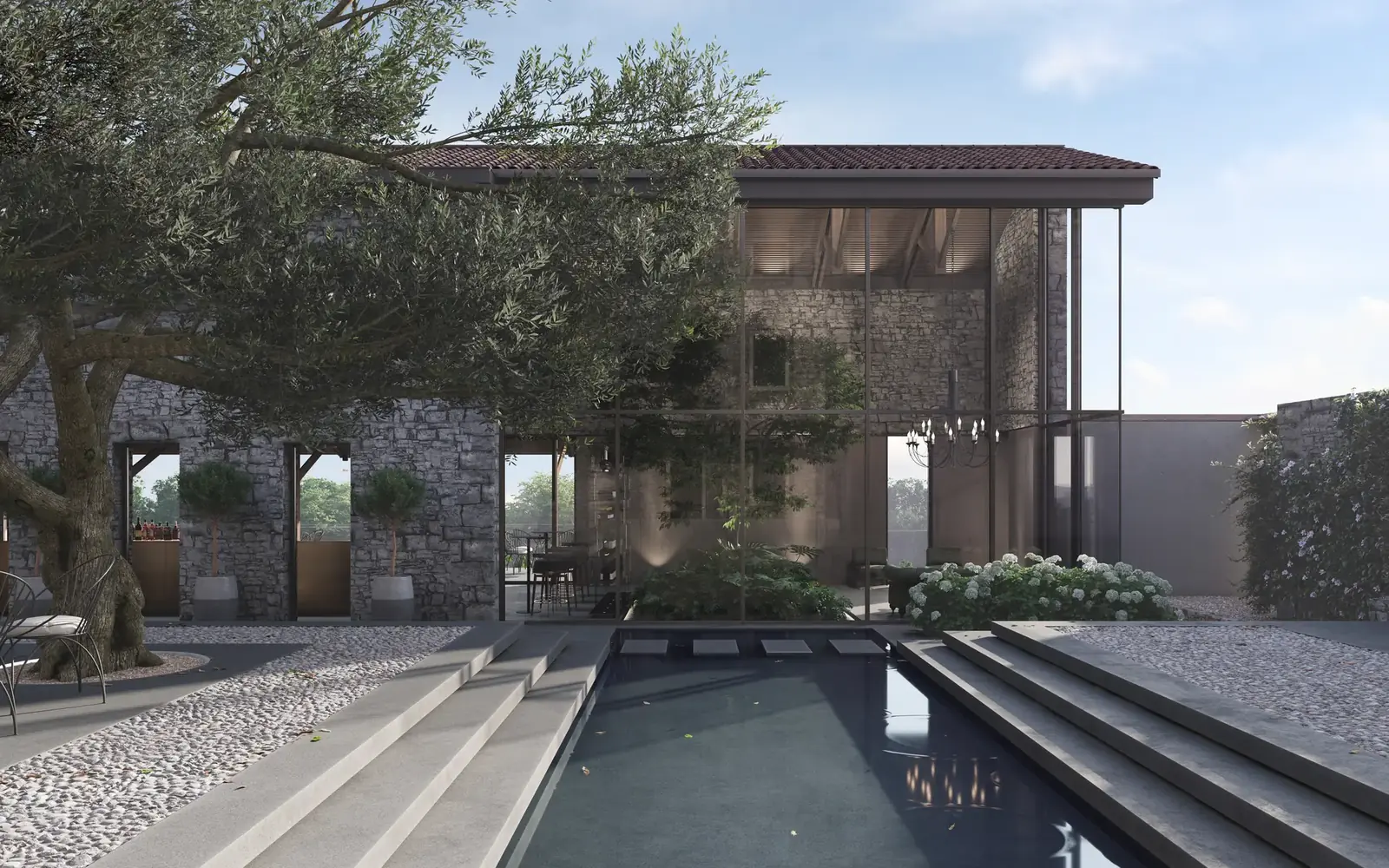 Cortile di Borgo Taurino con piscina e ulivi